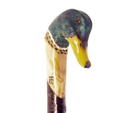 IAN JAMES A FINE NEW AND UNUSED HAND CARVED SPORTSMAN'S STAFF, measuring approx. 51in. in length, with hard wood shaft, the t