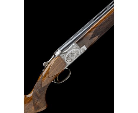 FABRIQUE NATIONALE A 12-BORE 'B2G' SINGLE-TRIGGER OVER AND UNDER EJECTOR, serial no. 60164 S77, 27 1/2in. nitro barrels with 