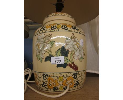 Cream ground and floral decorated table lamp in the form of a ginger jar with shade