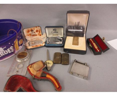 Cased Meerschaum pipe (at fault), boxed Dunhill lighter, another unboxed Dunhill lighter and various other lighters and other