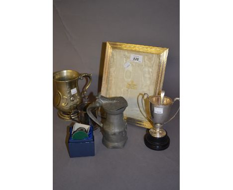 Mappin and Webb London silver mounted rectangular photograph frame together with a small silver trophy cup, silver spoon and 