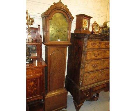 George III oak longcase clock with an arched hood above an arched door and plinth base, the brass dial with Arabic and Roman 