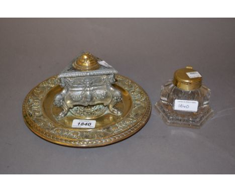 Circular brass and spelter inkwell together with a hexagonal glass inkwell with brass cover