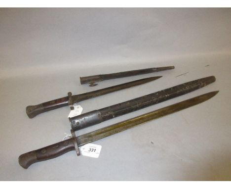Early 20th Century Wilkinson bayonet with scabbard together with a smaller 1907 bayonet