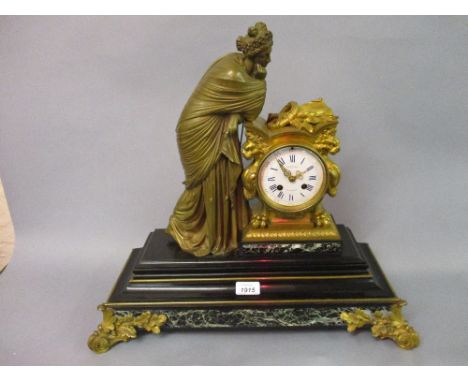 Mid 19th Century ormolu figural mantel clock, the eight day movement signed Causard a Paris, the black slate and green marble