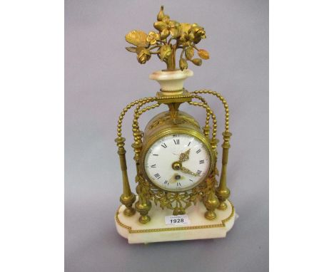 19th Century French ormolu mantel timepiece, the enamel dial with Arabic and Roman numerals, signed Pochon, the single train 