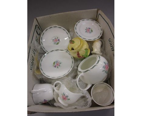 Susie Cooper floral decorated porcelain part tea service together with a Carlton Ware preserve pot with cover and spoon CONDI