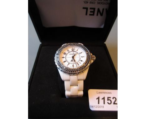 Ladies Chanel J12 wristwatch with white ceramic case and bracelet strap, with black diamond set bezel containing one hundred 