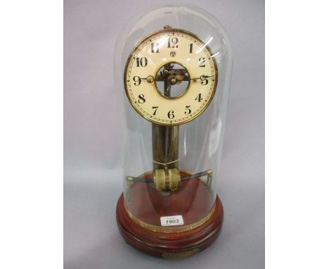 Horo - Electriques clock with a white chapter ring enclosing a skeletonised movement, supported on a cylindrical column to th