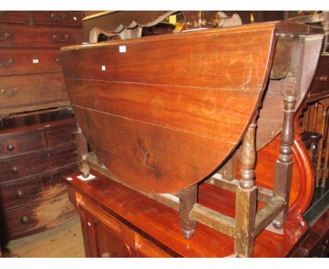 18th Century oak oval gate leg table on baluster turned supports with stretchers