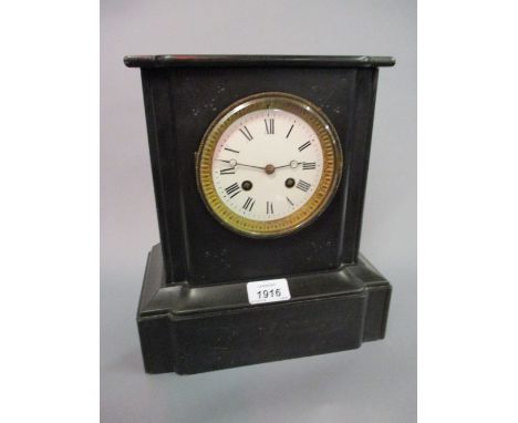 Small black slate two train mantel clock with pendulum
