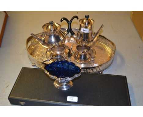 Eric Clements for Mappin and Webb, a four piece plated tea service with stylised handles together with an oval plated galleri