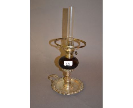 19th Century plated chamber candlestick converted to an oil lamp with a cranberry glass well