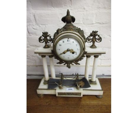 French white marble and ormolu mounted two train mantel clock, the white dial signed Courvoisier, Paris, within a drum head c