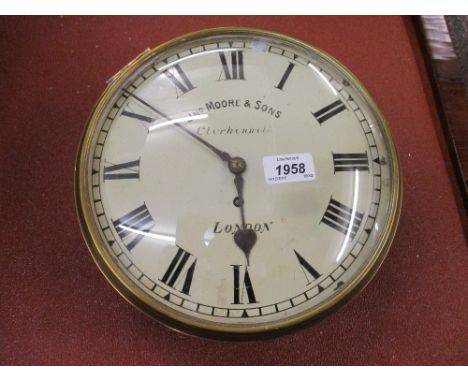 19th Century brass four pillar fusee movement with a circular painted dial, signed Jonathan Moore and Sons, Clerkenwell, toge