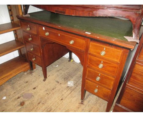 Edwardian mahogany line inlaid one piece pedestal desk having green leather inset top above an arrangement of nine drawers wi