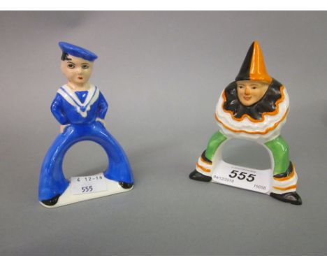 Two Carlton ware napkin rings in the form of a sailor and a clown