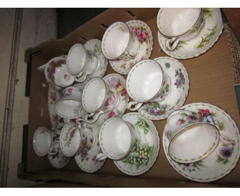 Set of twelve Royal Albert Months of the Year tea cups and saucers CONDITION REPORT Some minor crazing and loss of gilt but o