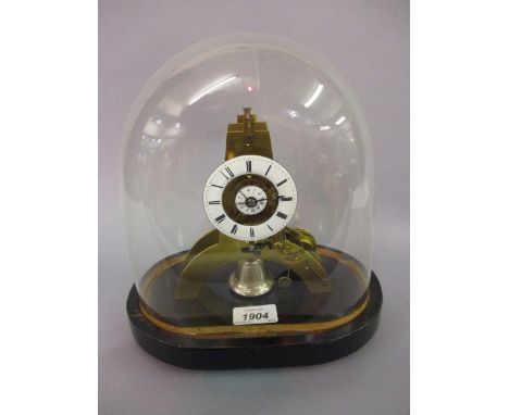 Small French brass skeleton clock with alarm, the white enamel chapter ring enclosing a central alarm dial on arched supports