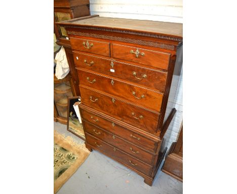 19th Century mahogany chest on chest having moulded key pattern cornice with blind fretwork frieze above two short and three 