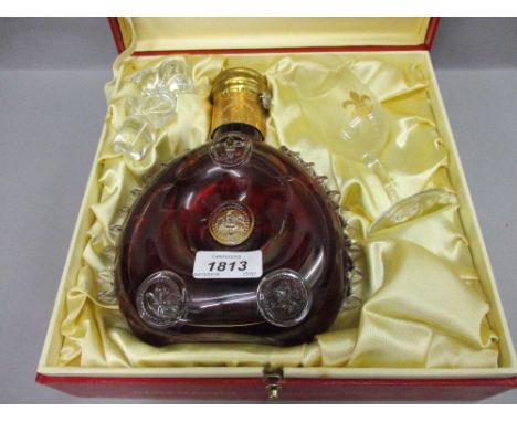 One bottle, Remy Martin Champagne Cognac in a Baccarat decanter, with original presentation box CONDITION REPORT 8.5ins tall 