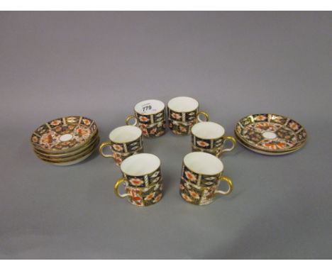 Set of six Royal Crown Derby Imari pattern coffee cups with saucers