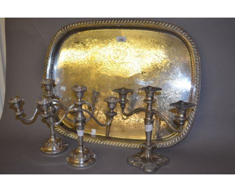 Oval plated galleried tray, pair of plated candelabra and single plated candelabra