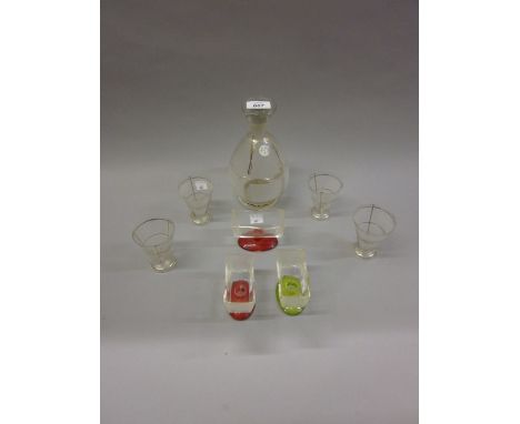 Art Deco glass liqueur decanter and four glasses together with three rectangular dishes with red and green bases