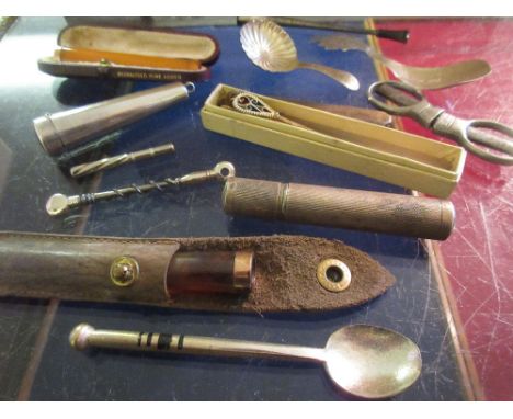 Bag containing a small quantity of various items including: two caddy spoons, various cheroot holders, sterling silver case e