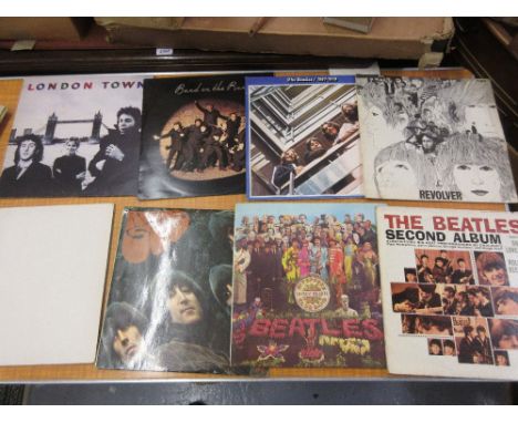 Three Beatles L.P.'s, the White Album, the Beatles 1967 - 1970 and Revolver, together with a quantity of other long playing r