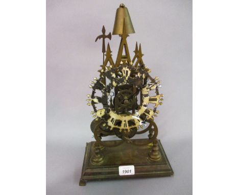 Brass single fusee skeleton clock with posing strike on a bell
