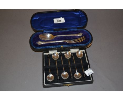 Cased set of six silver bean handled coffee spoons together with a cased silver Christening spoon and fork