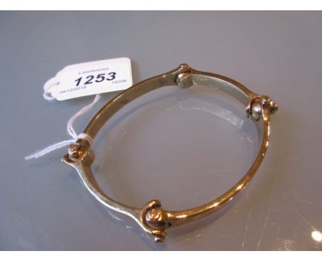 Unusual 9ct gold gimbal link bangle CONDITION REPORT 48.5gms. One of the links has a screw fitting which has to be undone to 