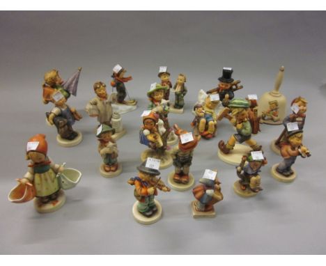 Collection of nineteen Goebel Hummel figures of children, together with a Hummel table bell