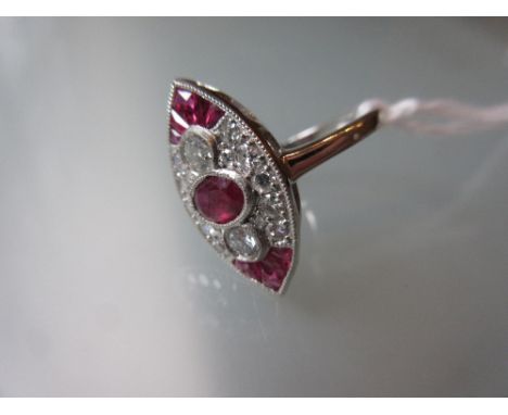 Platinum ruby and diamond marquise shaped panel ring