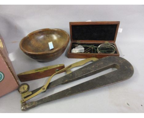 19th Century mahogany cased set of balance scales, a small turned wooden dairy bowl, a small spirit level and a brass and bla