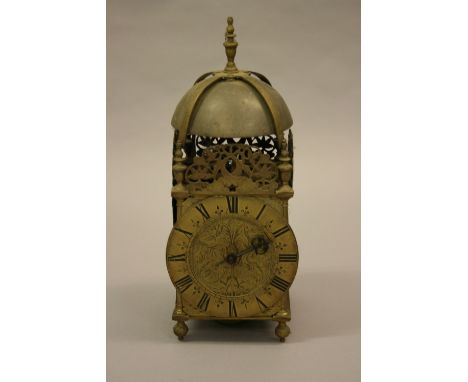 Antique brass lantern clock, the floral engraved dial with brass chapter ring and Roman numerals, unsigned, the single train 