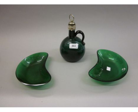 Antique green glass bottle decanter with plated collar and stopper, together with a pair of similarly coloured kidney shaped 