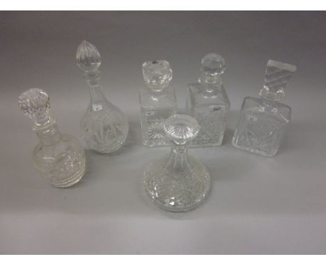 Two square cut glass decanters with stoppers, similar rectangular decanter and three circular glass decanters with stoppers