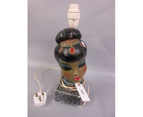 Thai plaster table lamp in the form of a female head