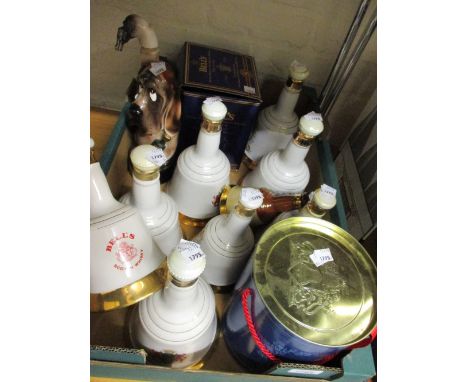 Six bottles Bell's Scotch whisky in Wade Royal Commemorative decanters, together with three similar smaller Bell's whiskies, 