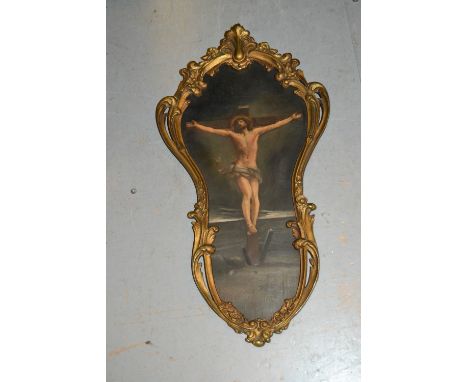 Ornate gilt framed portrait of Christ on the cross