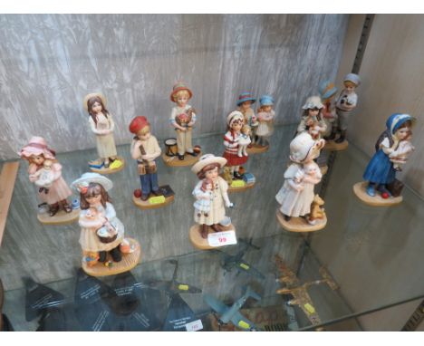 TWELVE ROYAL ORLEANS JAN HAGARA LIMITED EDITION CERAMIC FIGURINES OF CHILDREN