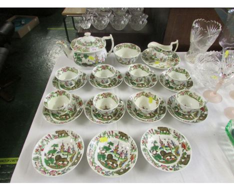 DECORATIVE CERAMIC TEA SERVICE WITH PATTERN DEPICTING WILD ANIMALS, HUNTERS AND FLOWERS (AF)
