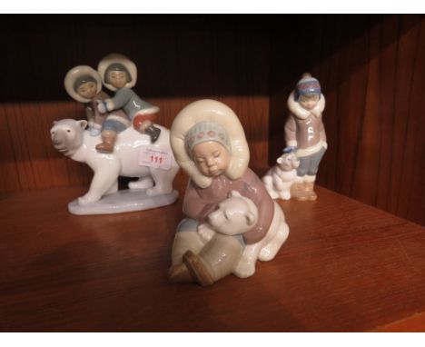 THREE LLADRO FIGURAL GROUPS OF INUIT CHILDREN