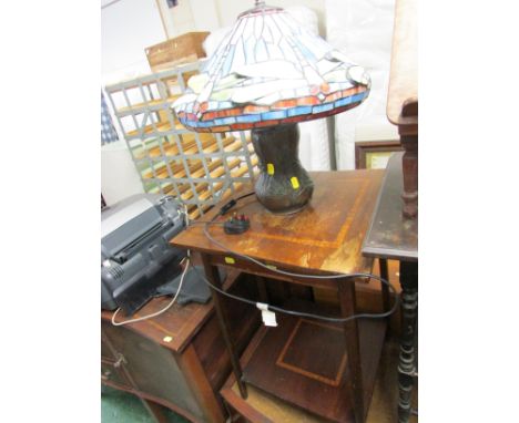 TABLE LAMP WITH A COLOURED LEADED GLASS SHADE AND CAST METAL BASE