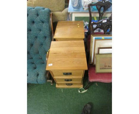 PAIR OF LIGHT OAK THREE-DRAWER BEDSIDES WITH METAL HANDLES