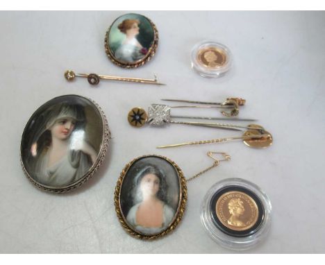 Three portrait brooches, together with nine stick pins and two full sovereigns (14)