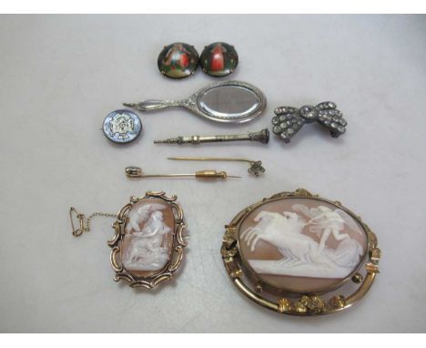 Two shell cameo brooches together with two stick pins, one tested as 9ct gold, a collar pin and a scarf holder, both stamped 