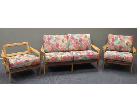 zzz A 20th century blonde oak three piece suite A 20th century blonde oak three piece suite to include a two seater sofa 135c